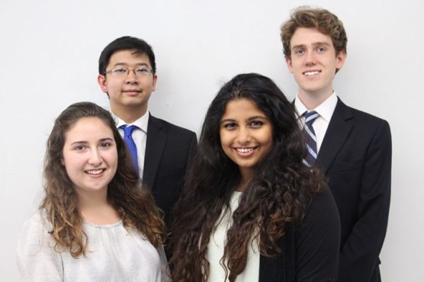 A group of students take a photo together.