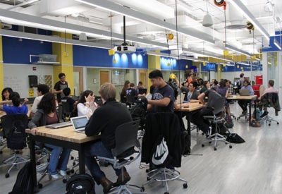 A class works at tables within the BME Design Studio.