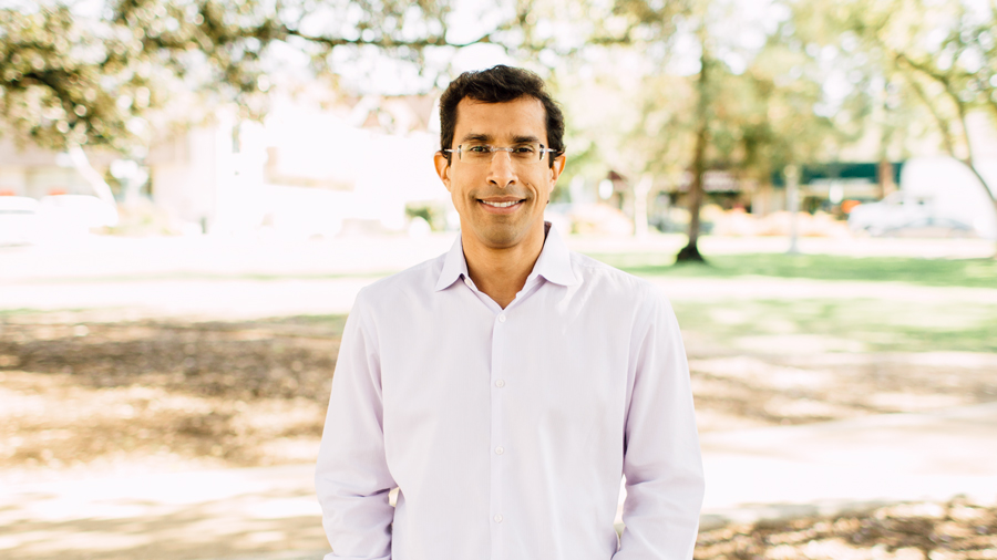 BME alum Bassil Dahiyat stands looking at the camera and smiling.