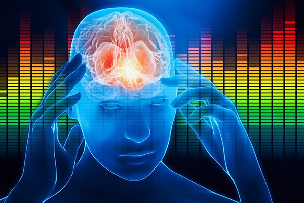 A blue image of a man show the brain in front of colorful bars.