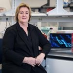 Jane Carlton is pictured in a lab.
