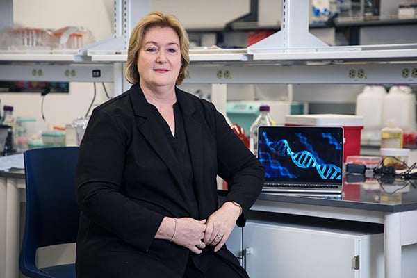 Jane Carlton is pictured in a lab.
