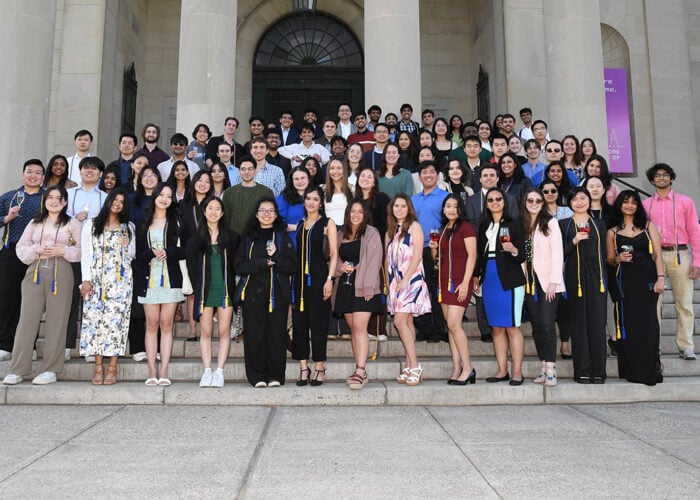 The graduating class gathers for a group photo.