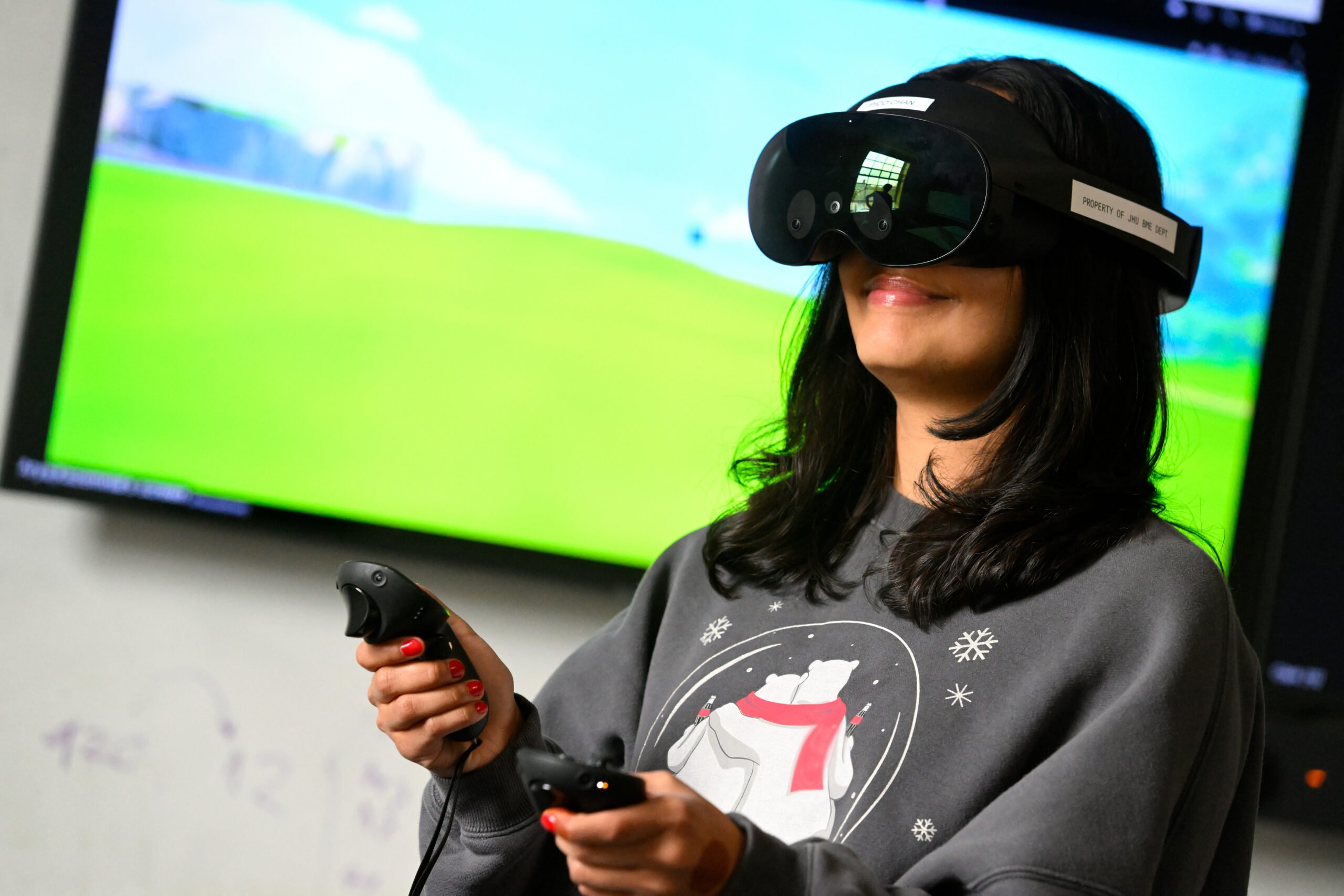Shalika Subramanian uses virtual reality headset